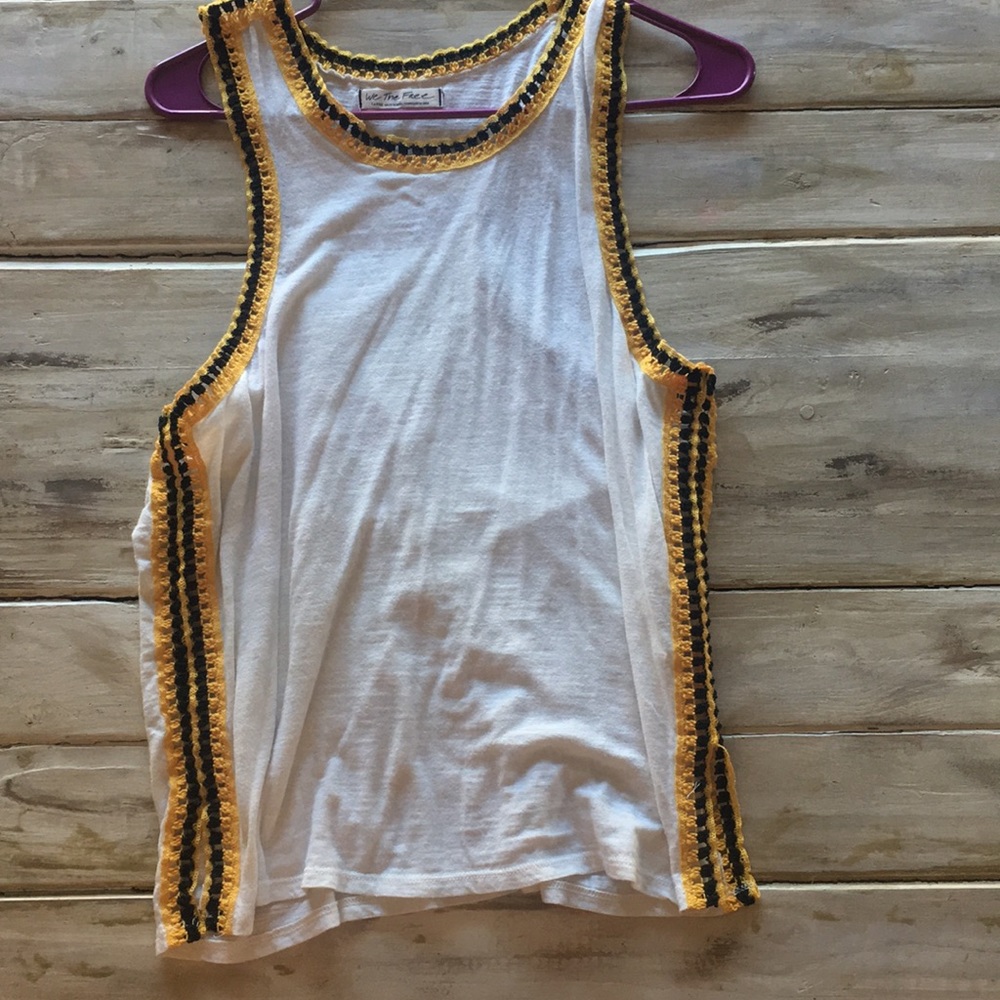 White tank with black and yellow boarder stitch